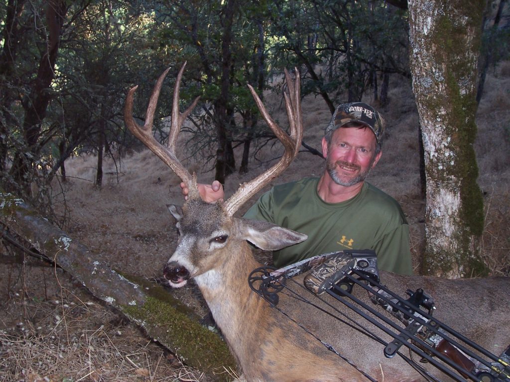 The author with a very large early-season archery Columbia blacktail buck taken near Medford, Oregon.