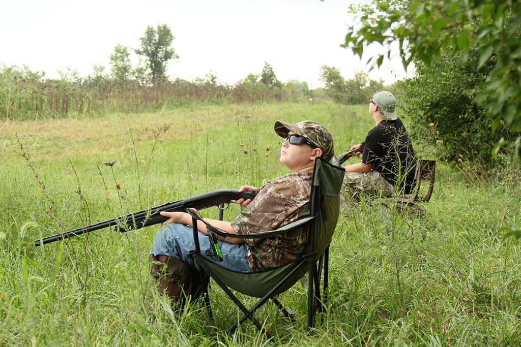 Safety first. Eye protection is a must in a busy dove field, and help new young hunters take only safe shots. Photo C. Pendley