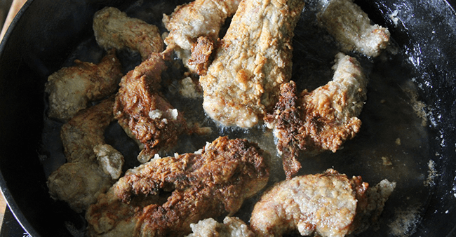 Fry Wings in skillet