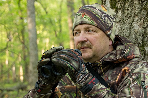 Hunter using Binoculars