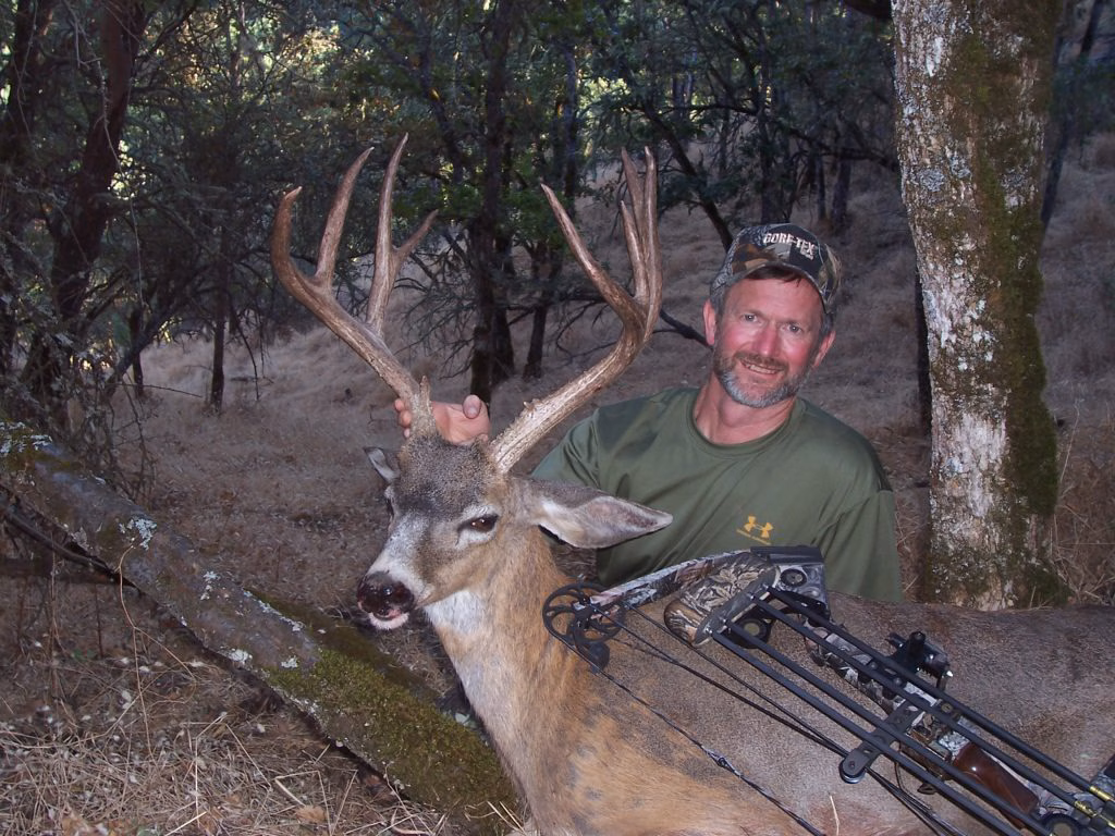 The author with a very large early-season archery Columbia blacktail buck taken near Medford, Oregon.