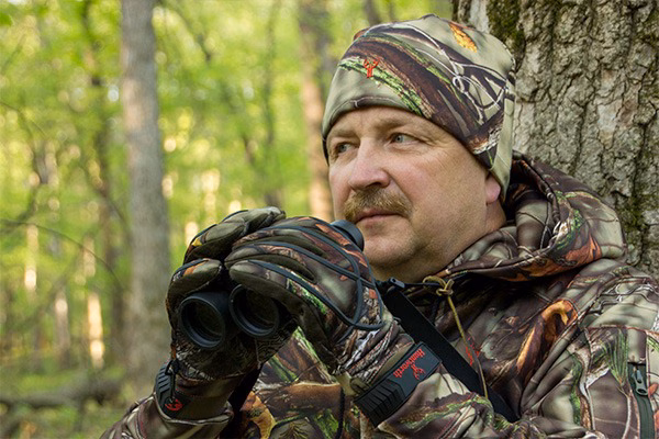 Hunter using Binoculars